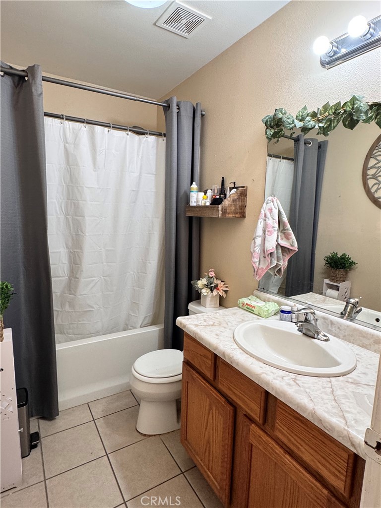 142 White, Tulare, CA 93274