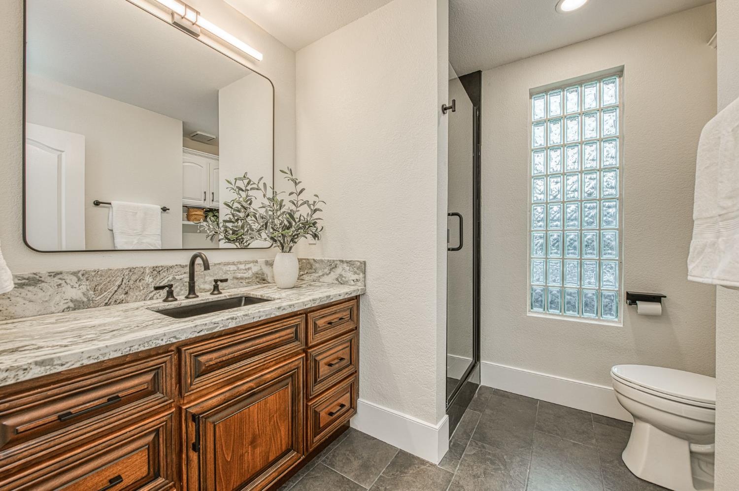 9381 N Woodmont Dr, Fresno, CA 93720