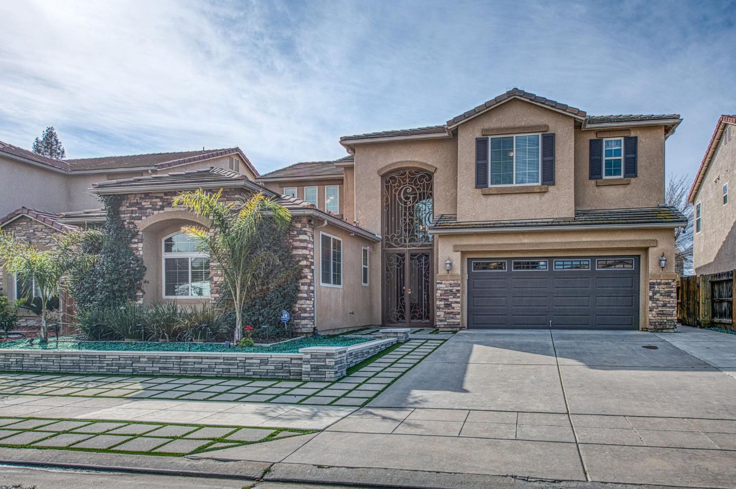 1407 E Via Marbella Dr, Fresno, CA 93730