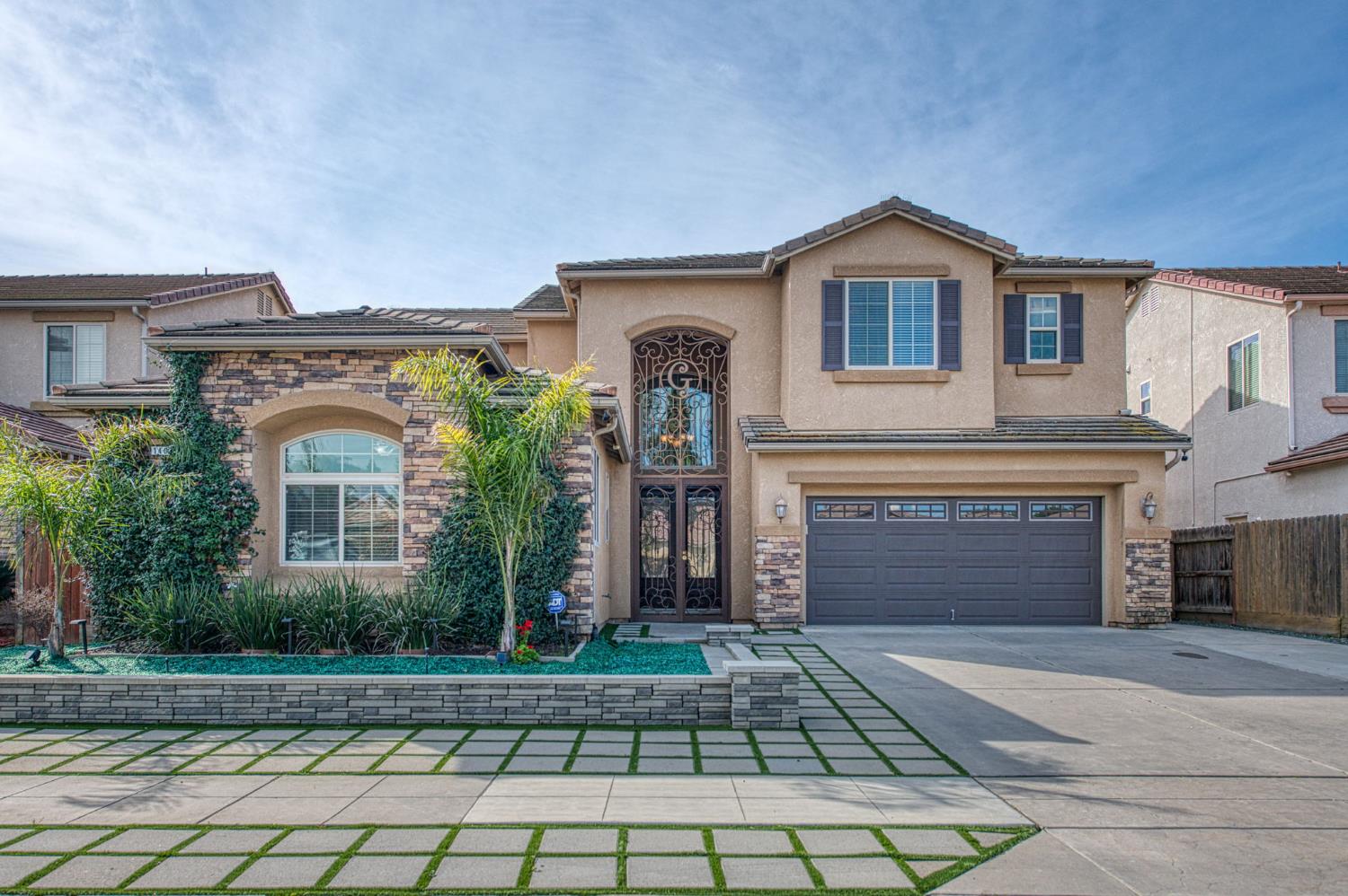 1407 E Via Marbella Dr, Fresno, CA 93730